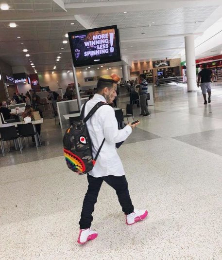 6ix9ine Spotted With Our Rainbow Shark Backpack