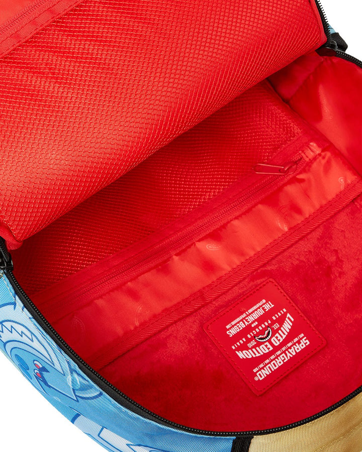 TIMMY SITTNG ON MONEY CHAIR DLXR BACKPACK