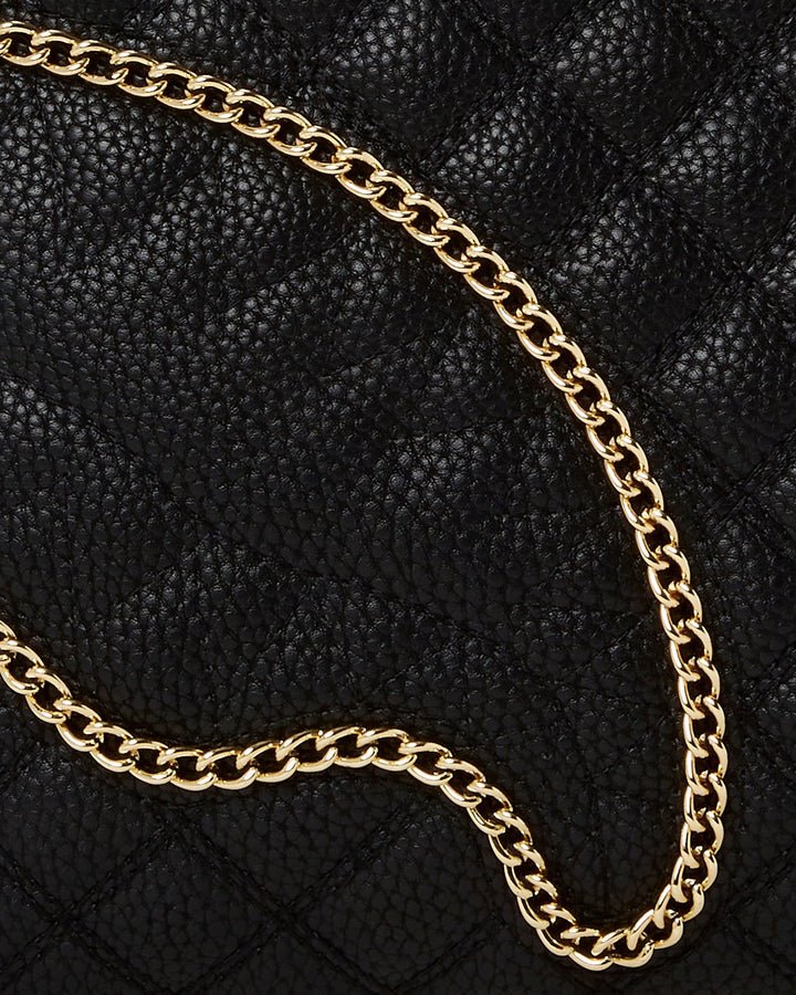 SPLIT QUILT SHARK POUCHETTE