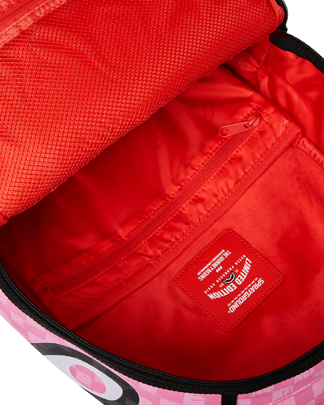 PINK AND BLACK DRIP CHECK DLXSV BACKPACK