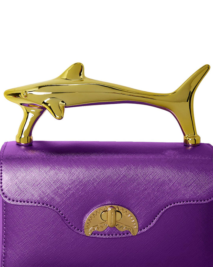 SHARK HANDLE CLUTCH
