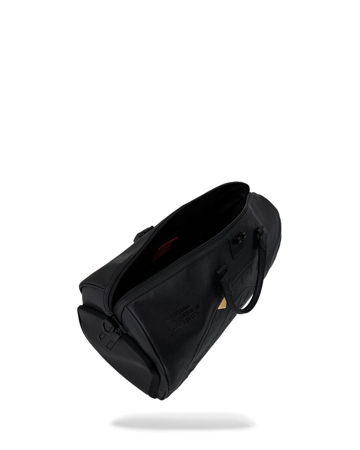 BLACKED OUT EMBOSSED GOLD TOOTH DUFFLE