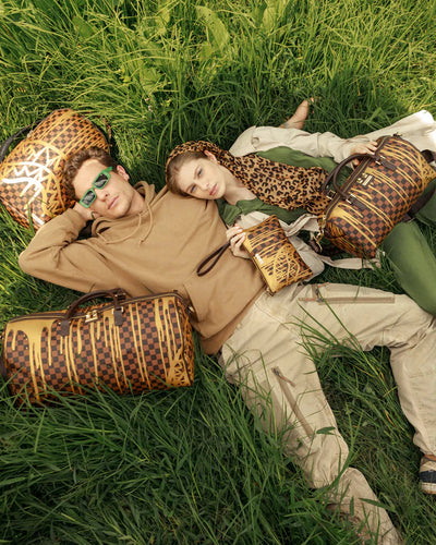 SPRAYGROUND SHARKS IN PARIS PAINT DRIP EMPEROR DUFFLE