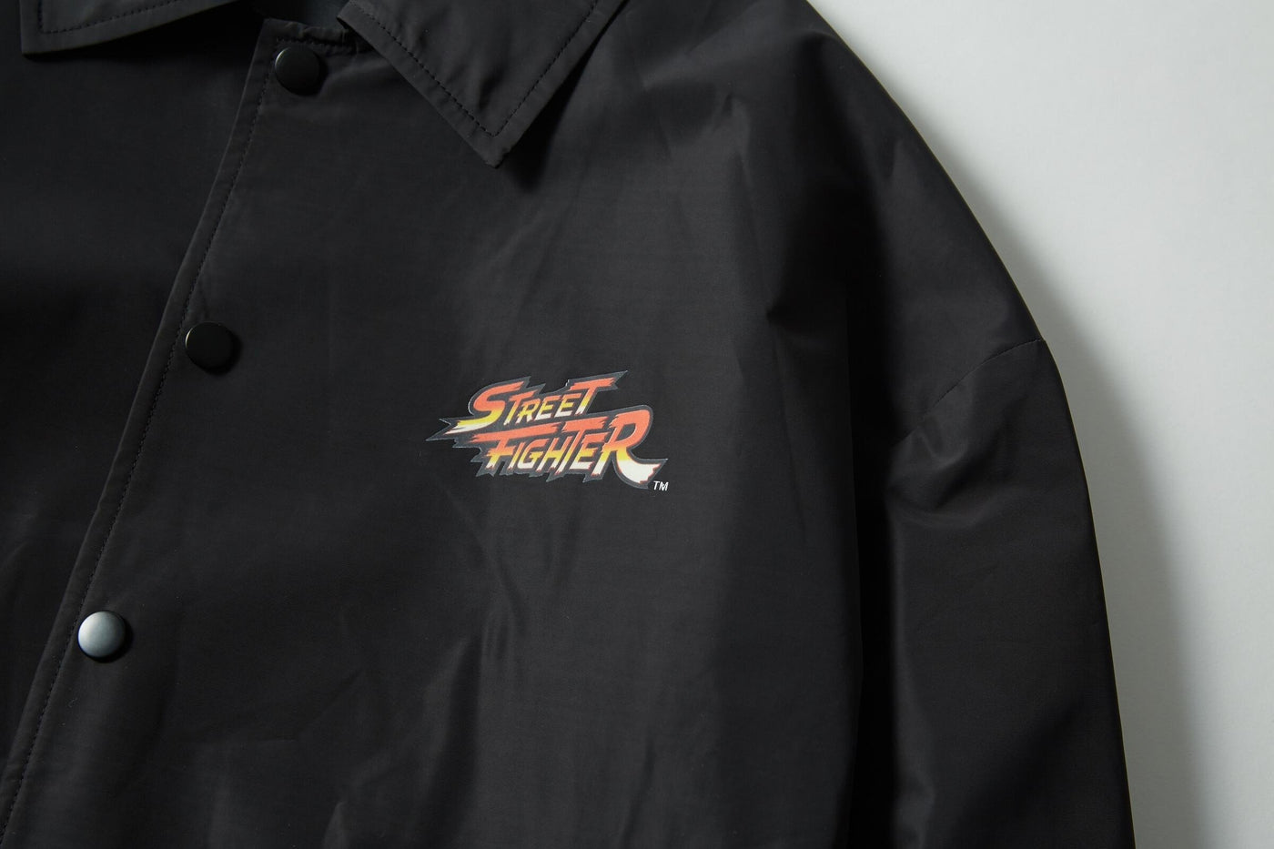 SPRAYGROUND JACKET STREET FIGHTER VILLIANS ON THE RUN BLACK