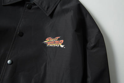 SPRAYGROUND JACKET STREET FIGHTER VILLIANS ON THE RUN BLACK